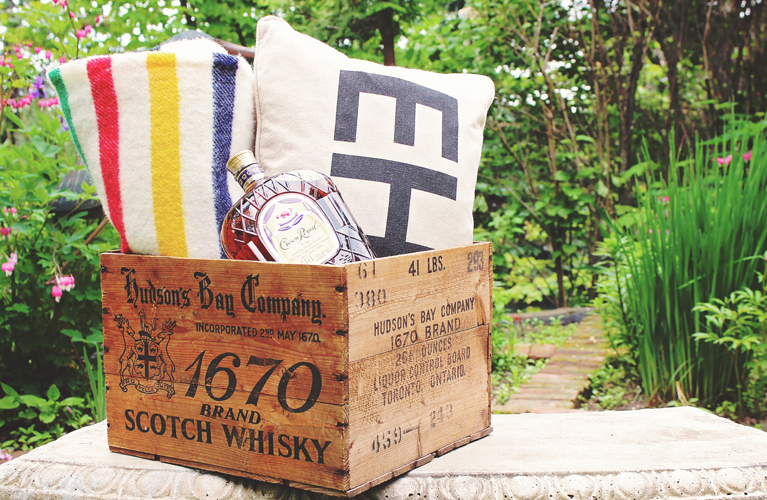 Canada Day Essentials. "Eh" pillow, Hudson's Bay pointe blanket, Hudson's Bay vintage crate, Canadian Crown Royal | Alex Inspired 